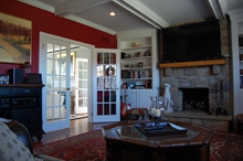 living-room-red-wall-fireplace-mount